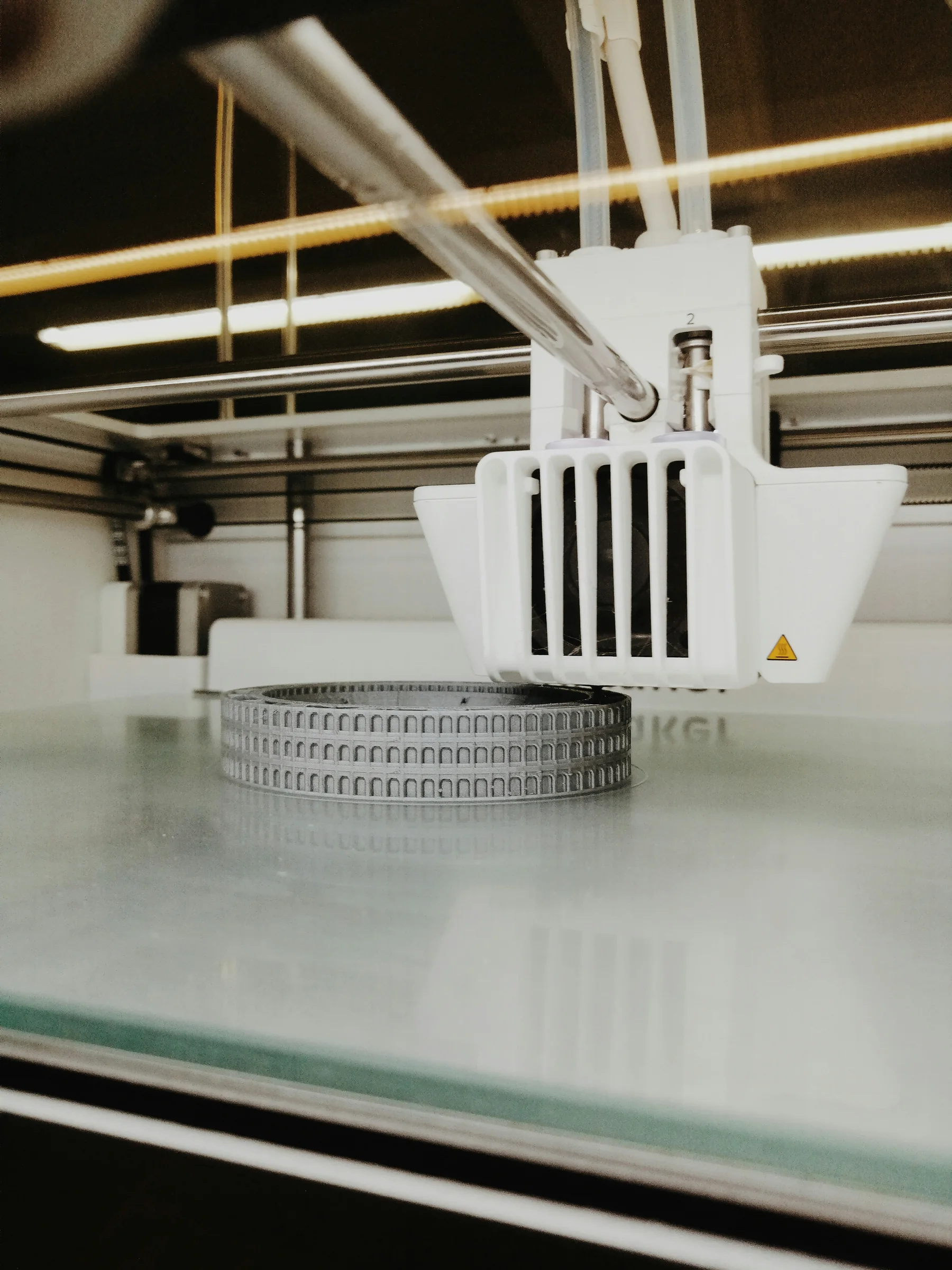 FDM additive manufacturing: extruding filament to build a part
